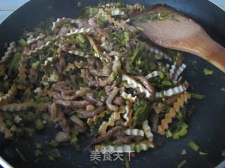 雪菜香干炒肉丝的做法步骤：9