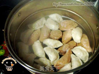 煮饺子不破皮的窍门--芹菜香干猪肉饺的做法步骤:22