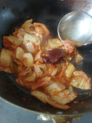 好吃不腻的下饭菜——辣白菜年糕烩排骨的做法步骤:9
