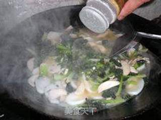 像盛开墨绿菊花-----塔苦菜花菇肉丝年糕汤的做法步骤:11