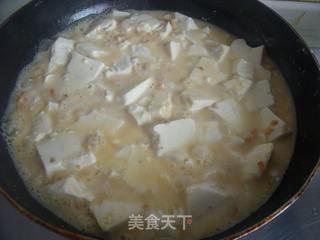 【苏菜】百姓餐桌上的鲜香爽滑----蟹黄豆腐的做法步骤：7