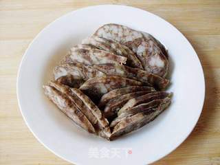 【塔吉锅】鸡腿腊肠煲仔饭的做法步骤：7