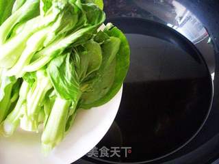 【塔吉锅】鸡腿腊肠煲仔饭的做法步骤:11