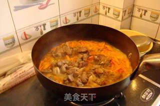 新疆羊肉手抓饭的做法步骤:10