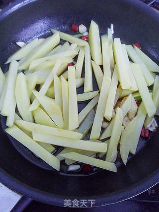 【COOK100畅销组合装试用报告3】干煸土豆条的做法步骤:8