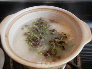 蚕豆花鸡蛋粥的做法步骤:8