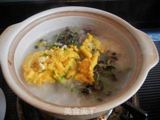 蚕豆花鸡蛋粥的做法步骤:9