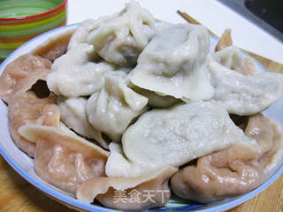酸菜饺子的做法步骤:16