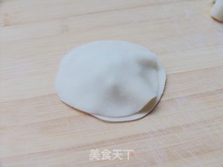 美食带来新享受——萝卜鲜肉花环水饺的做法步骤:11