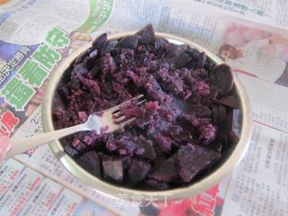花生馅滴《紫薯芝麻球】的做法步骤：7