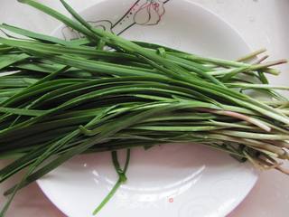 绝配--韭菜炒鱿鱼的做法步骤:3