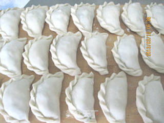 出九的韭(九)菜馅饺子----如何调韭菜馅不出水?的做法步骤:20