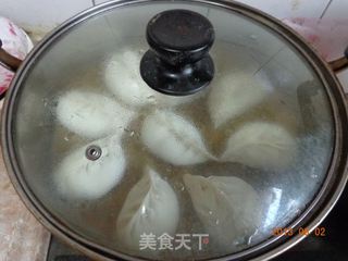 猪肉香菇圆白菜蒸饺的做法步骤：11