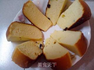 松软可口色泽金黄的———电饭锅海绵牛奶葡萄干蛋糕的做法步骤:13