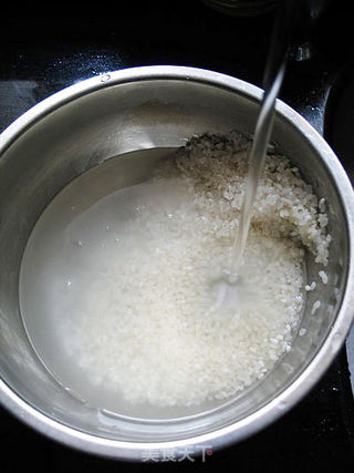 腊鸭肾瑶柱粥---最适合小朋友喝的粥的做法步骤:7