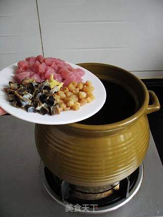 腊鸭肾瑶柱粥---最适合小朋友喝的粥的做法步骤:8