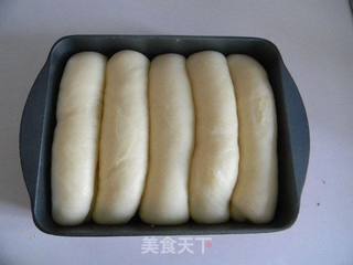 全奶蛋黄椰蓉排包的做法步骤:11
