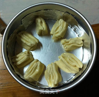 奶香浓郁的练奶手撕面包的做法步骤:11