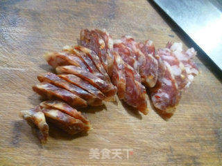 油菜蕻麻辣肠炒年糕的做法步骤:5