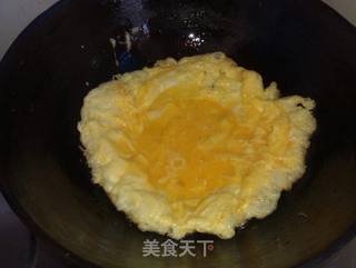 【亨氏番茄酱试用报告】番茄酱洋葱炒鸡蛋的做法步骤：5