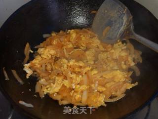 【亨氏番茄酱试用报告】番茄酱洋葱炒鸡蛋的做法步骤：7