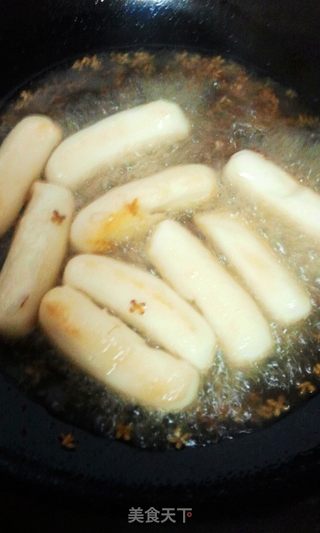 让人欲罢不能的【糖桂花炒年糕】的做法步骤:6