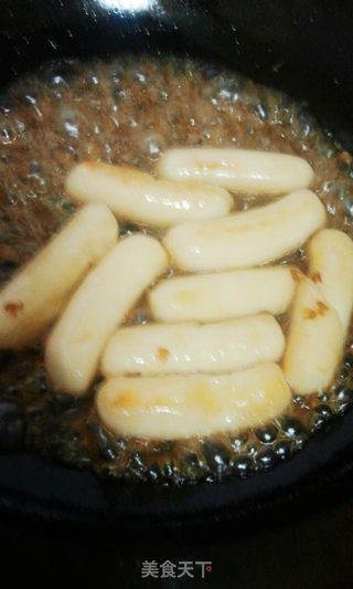 让人欲罢不能的【糖桂花炒年糕】的做法步骤:7