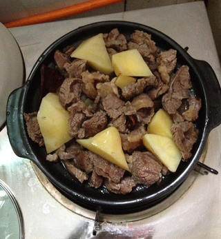 土豆煲牛腩的做法步骤:13