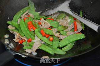 滑肉炒荷兰豆的做法步骤:9