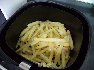 炸薯条的做法步骤:11