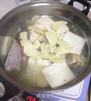 豆腐炖鱼头的做法步骤:8
