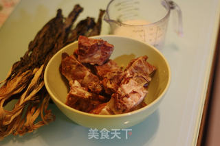菜干咸猪骨粥的做法步骤：1