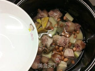 猪尾花生木瓜汤的做法步骤:6