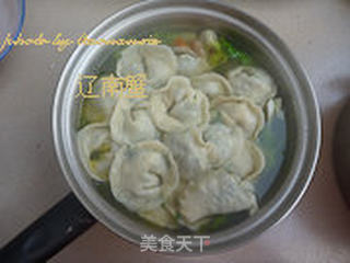 酸汤酥肉元宝饺的做法步骤:11