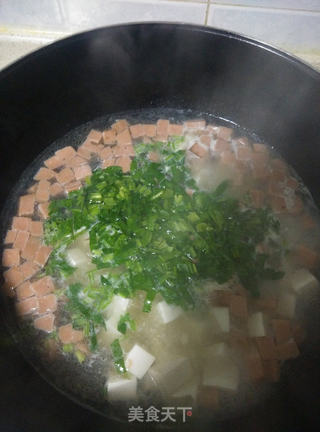 青菜豆腐汤的做法步骤：7
