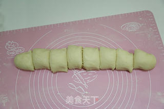 椰蓉面包卷(烤箱烤面包卷的方法)的做法步骤:9