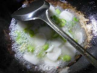 生菜蚕豆炒年糕的做法步骤:7