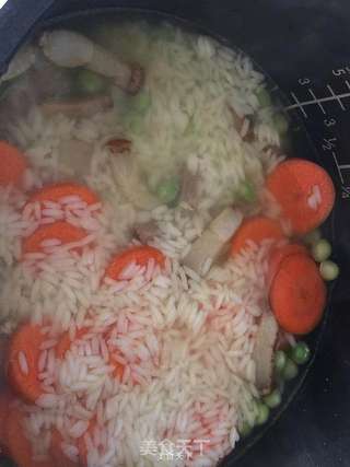 腊肉豌豆焖干饭的做法步骤：5