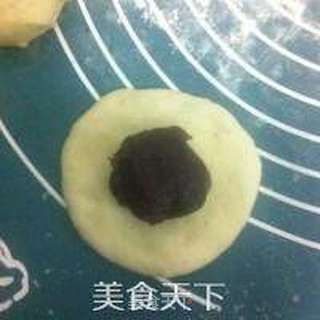 熊猫豆沙包的做法步骤:11