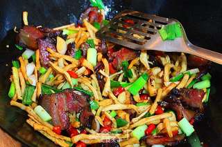 萝卜干炒腊肉的做法步骤:10