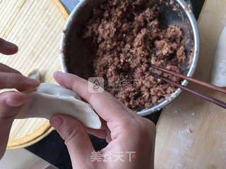 牛肉圆葱蒸饺的做法步骤:23