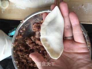 牛肉圆葱蒸饺的做法步骤:25