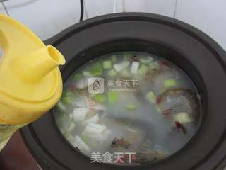 芹菜海鲜砂锅粥的做法步骤:11