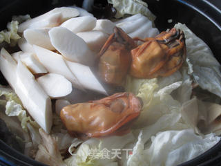金蚝鲜味砂锅煲的做法步骤:10