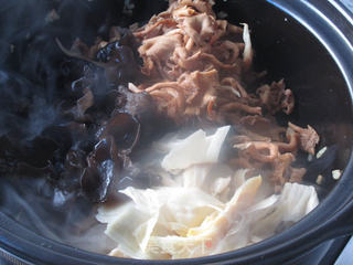 金蚝鲜味砂锅煲的做法步骤:8