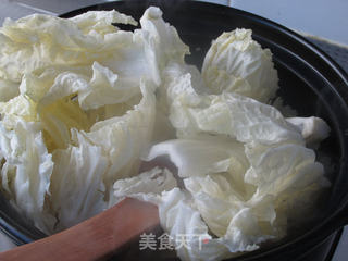 金蚝鲜味砂锅煲的做法步骤:9