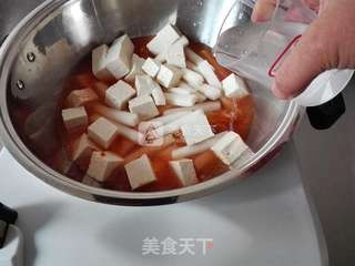 泡菜年糕豆腐汤的做法步骤:3