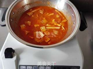 泡菜年糕豆腐汤的做法步骤:6