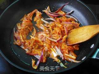 泡菜炒年糕的做法步骤:8