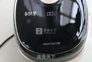 咸菜鸡肉煲仔饭电饭煲轻松做的做法步骤:13